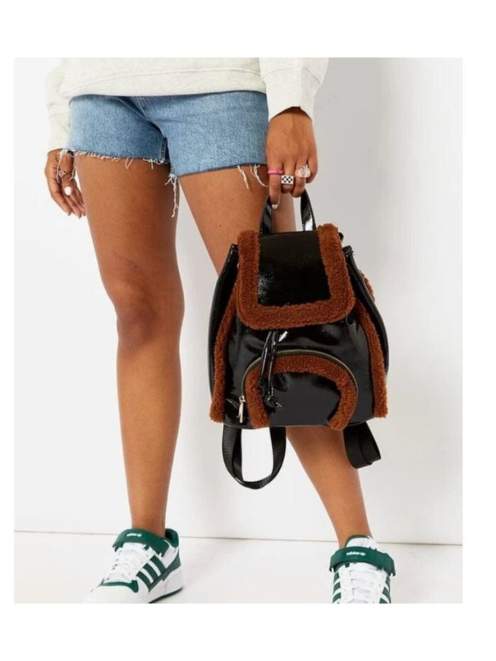 SKINNYDIP Scarlett shiny faux-fur trim school small girl's backpack in Black